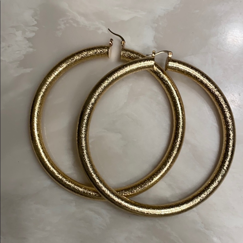 Large gold hoop earrings